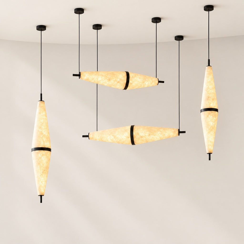 Fuselle mulberry silk pendants — two horizontal and two vertical fixtures arranged separately on a light warm neutral background; single pendants sold separately