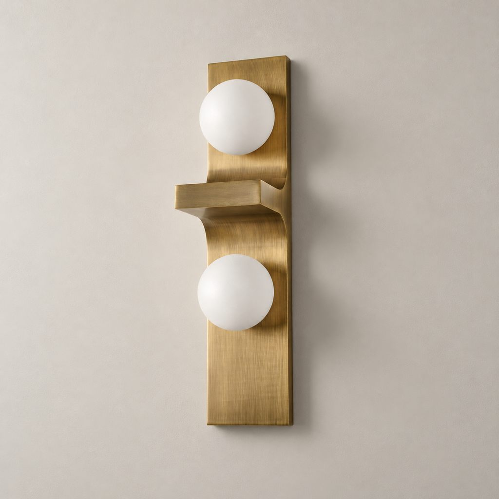 Unlit frosted-glass double-globe wall sconce on a taupe wall