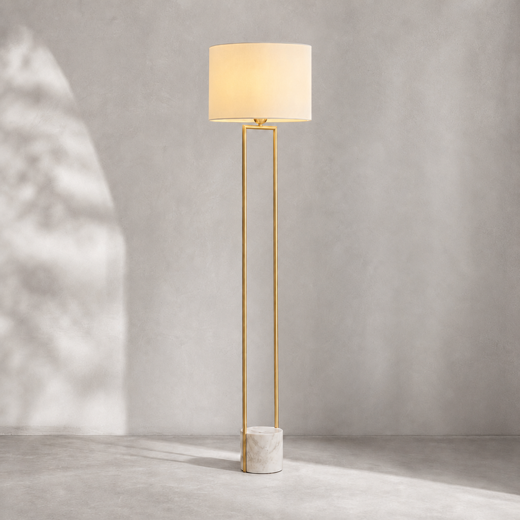 Double-Rod Marble Base Floor Lamp in natural brass on a warm neutral background