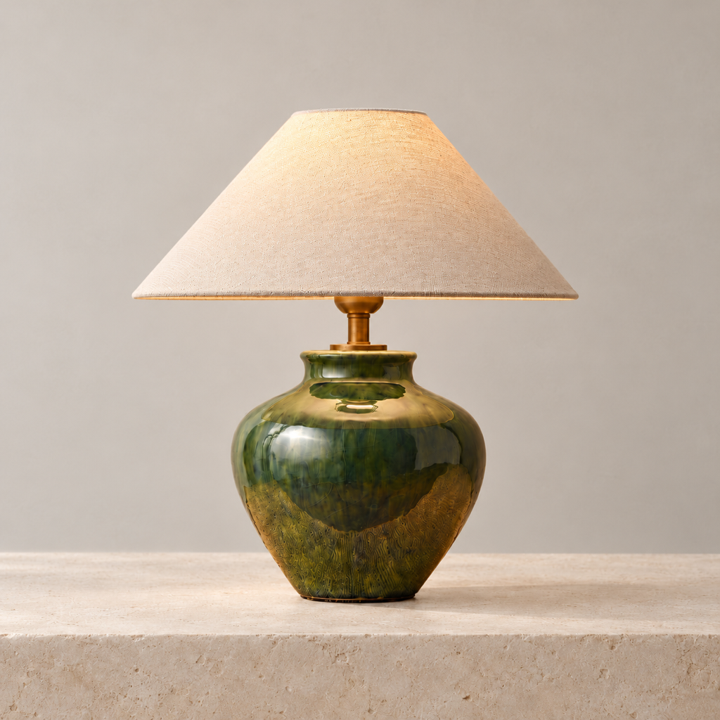 Taofou jade glaze ceramic table lamp on a warm ivory stone surface