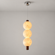 Three-globe natural mulberry silk vertical pendant with dark wood details, full product hero