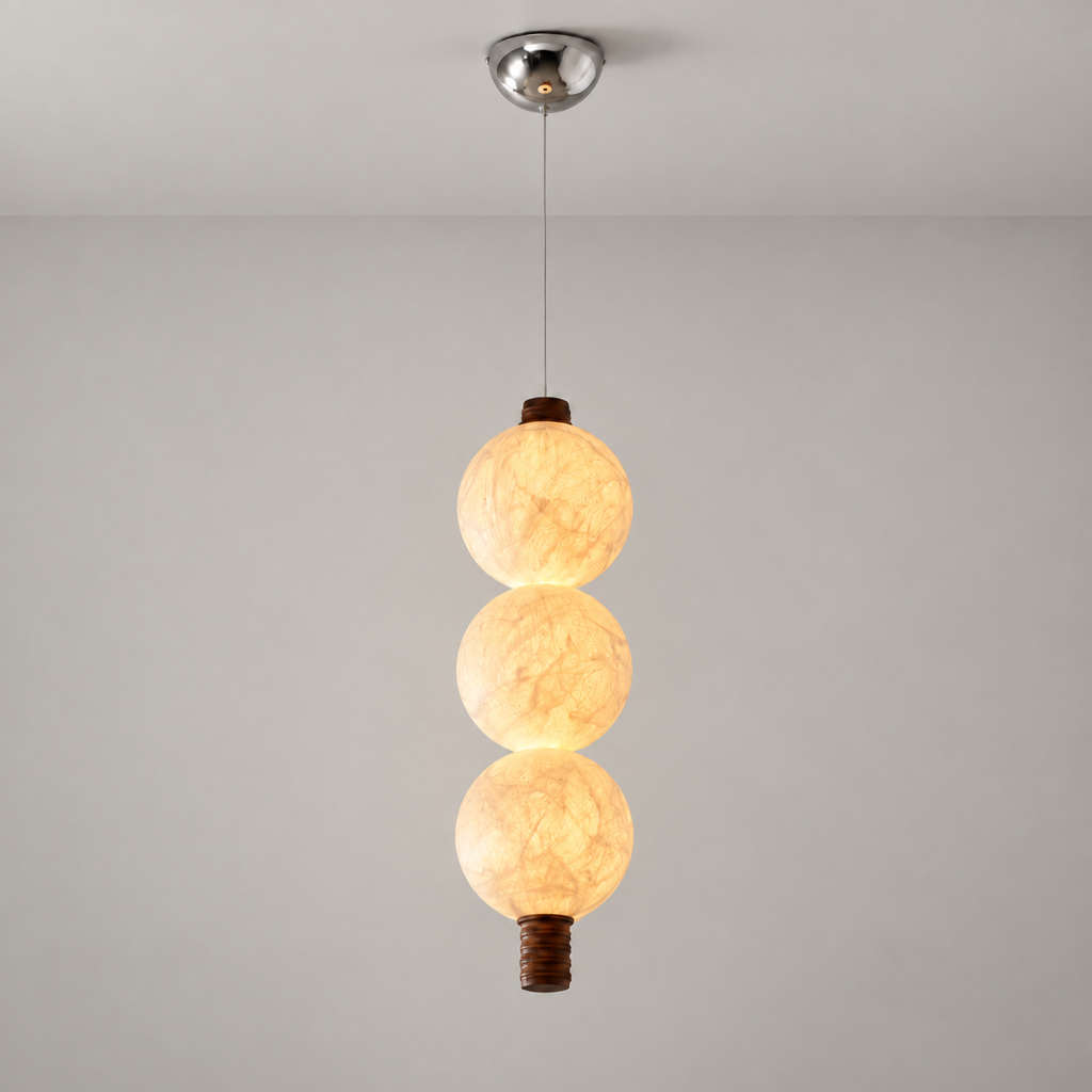 Three-globe natural mulberry silk vertical pendant with dark wood details, full product hero