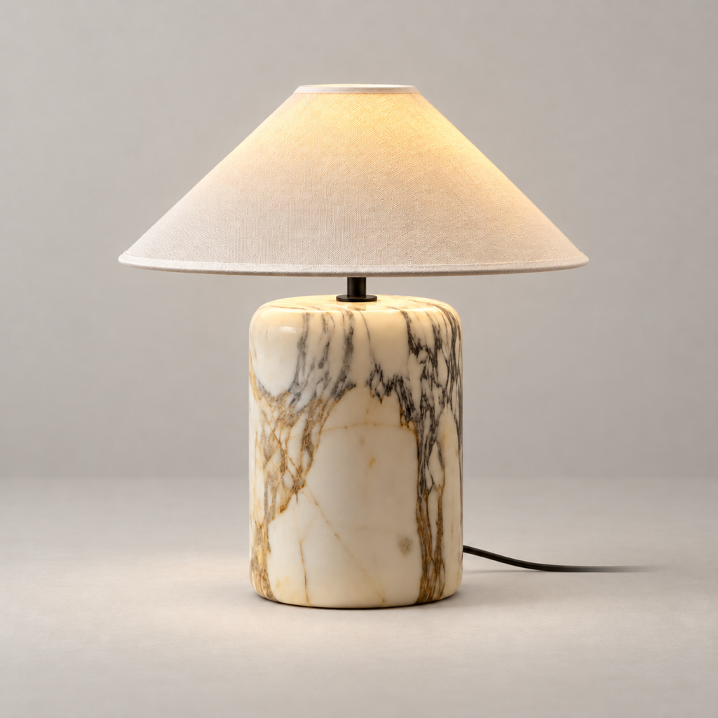 Block Mid-Century Marble Table Lamp on a warm greige background; Small Block26cm shade28cm height; white grey veined marble cylinder and linen