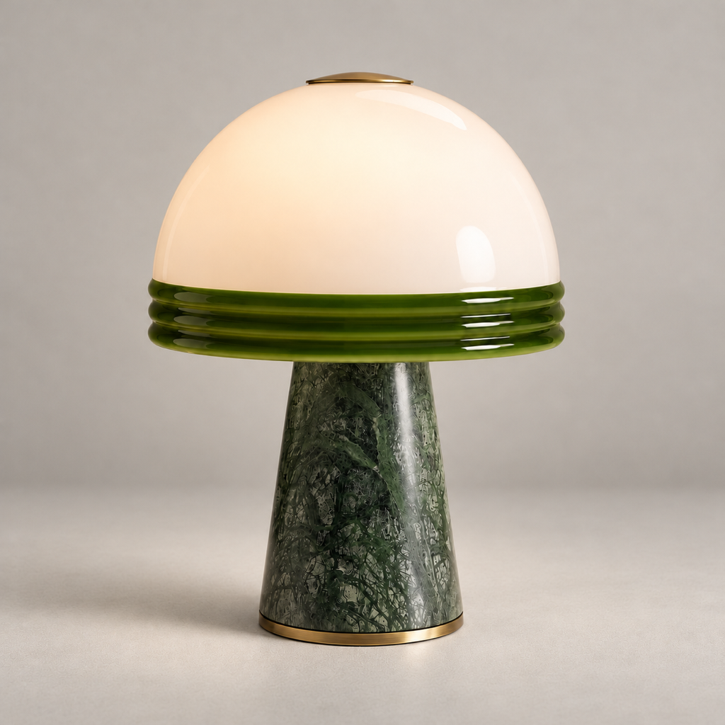 Cassie Marble Table Lamp with Acrylic Shade on a warm greige background; Cassie green marble and white acrylic dome