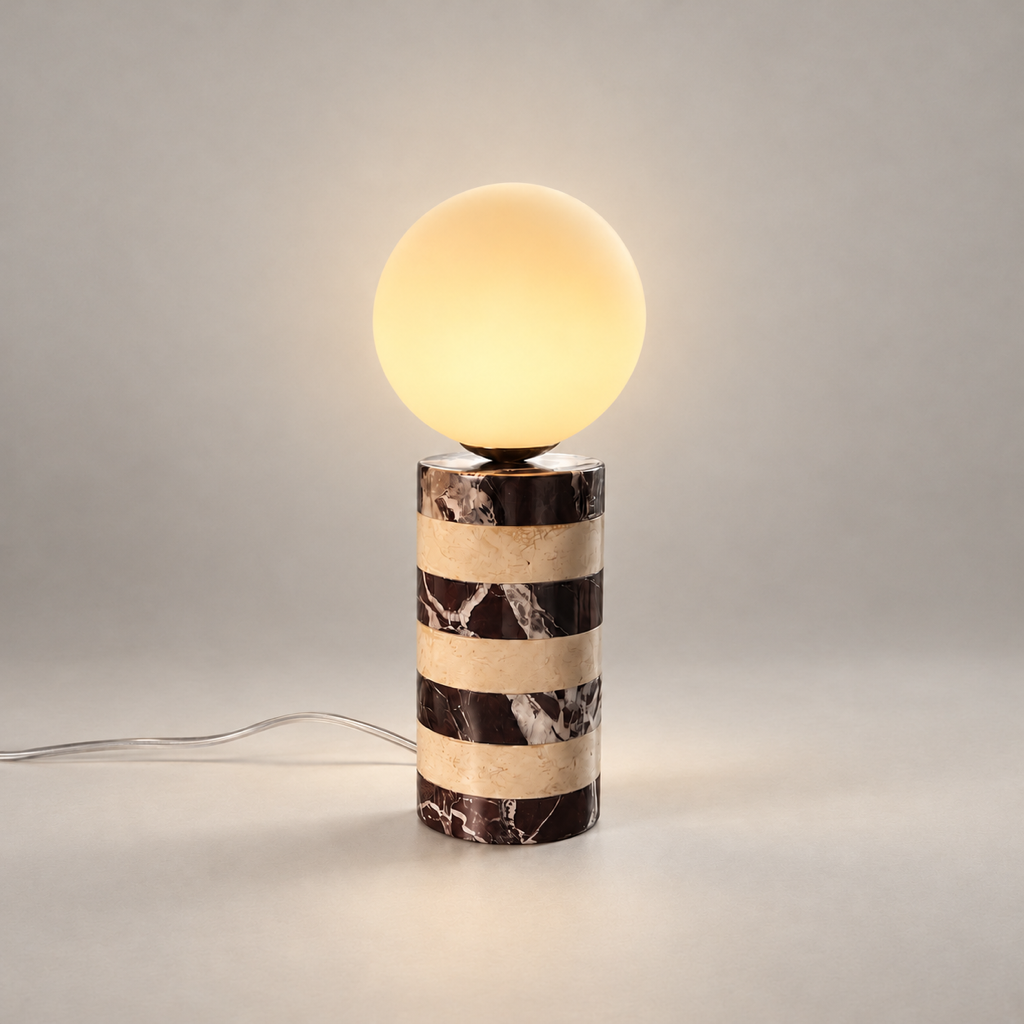Charade Marble Globe Table Lamp on a warm greige background; Brown white striped small globe table lamp