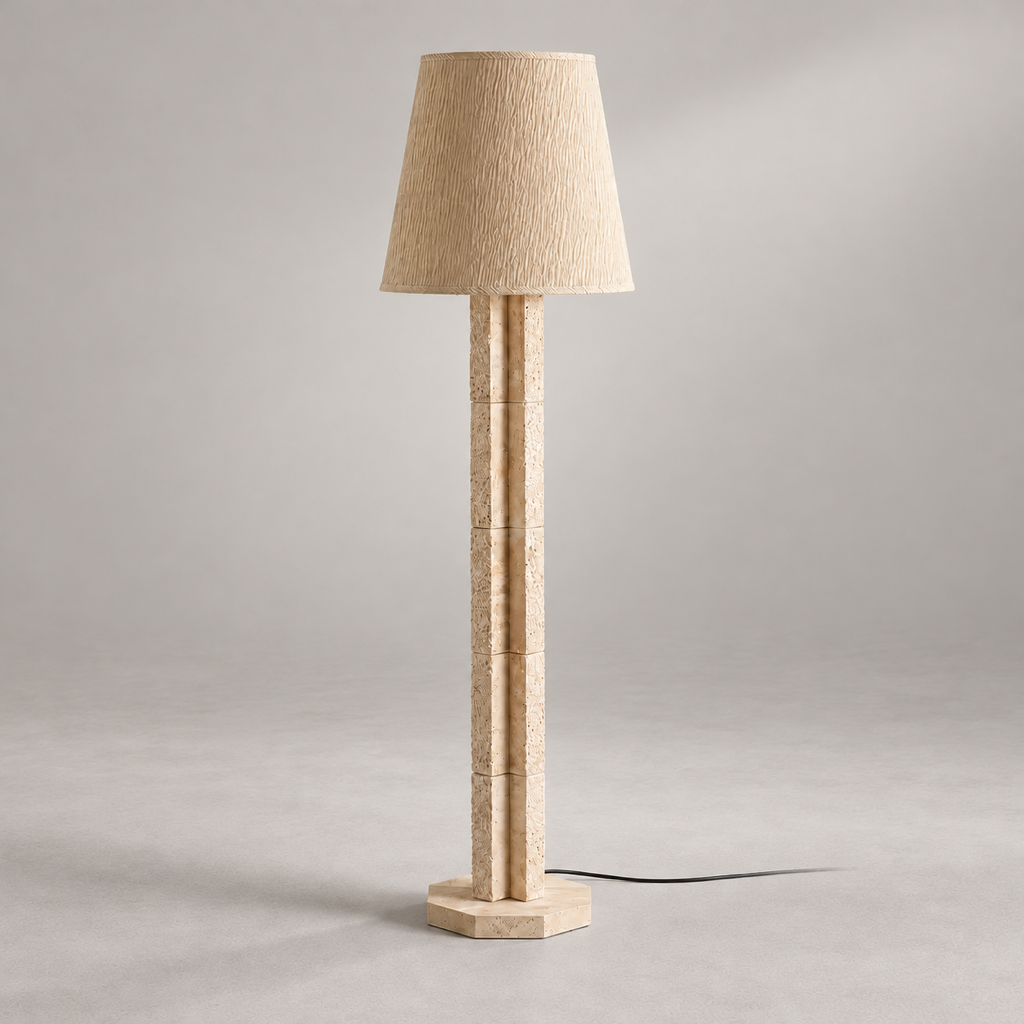 Hawksworth Travertine Floor Lamp on a warm greige background; Hawksworth floor / segmented cruciform beige column