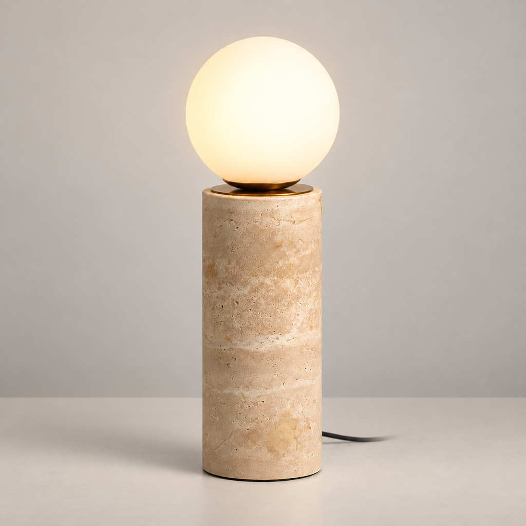 Core Japandi Travertine Table Lamp on a warm greige background; Beige cylindrical stone and globe