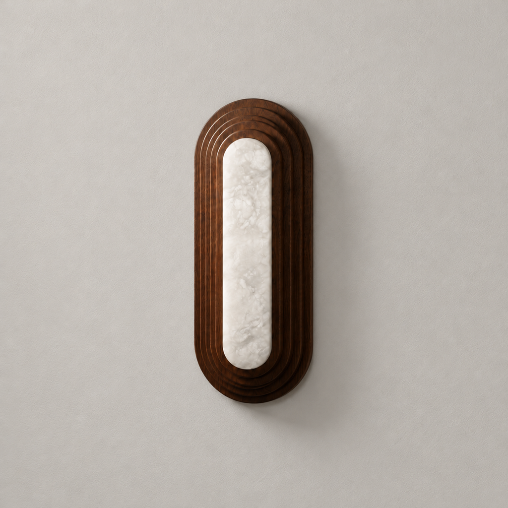 Ovelith black walnut and alabaster wall sconce, small size, unlit on a warm beige wall