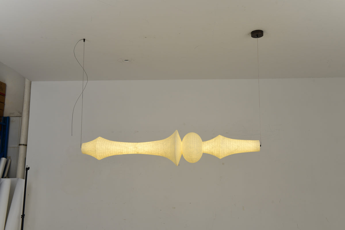 ARDEN LUME Orlithane linear pendant, Design E, actual illuminated product photograph showing the complete body and two-end suspension.