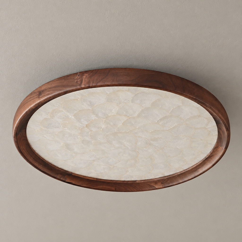 Orvennel walnut and shell flush mount ceiling light switched off on a warm beige ceiling