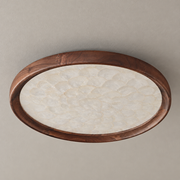 Orvennel walnut and shell flush mount ceiling light switched off on a warm beige ceiling