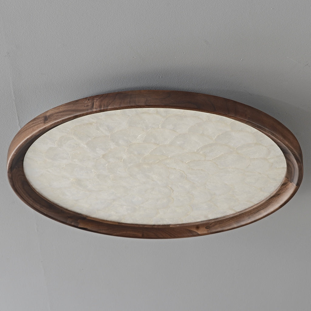 Real photograph of the complete walnut and shell ceiling light switched off