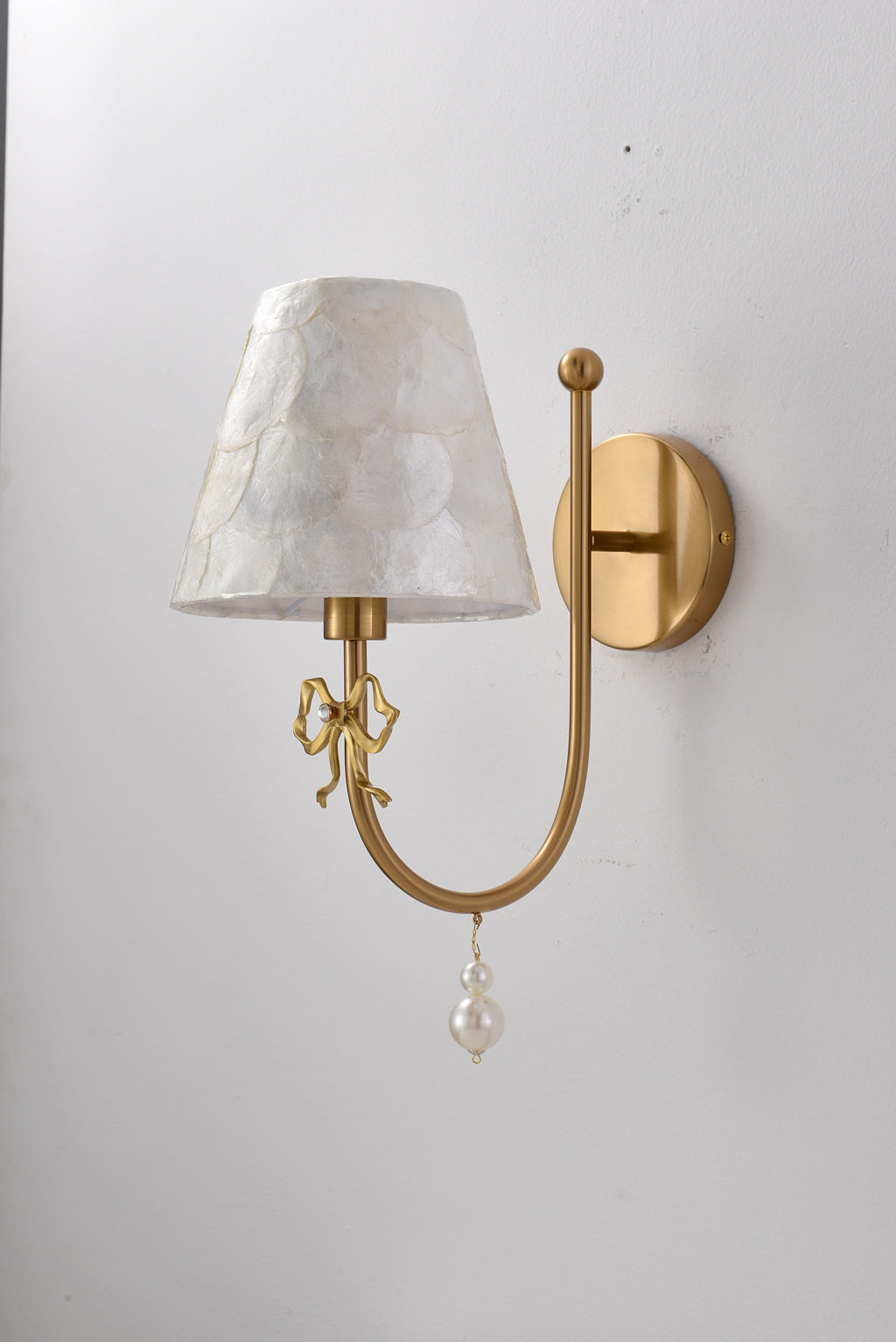 Rosnacre shell bow wall sconce - real off