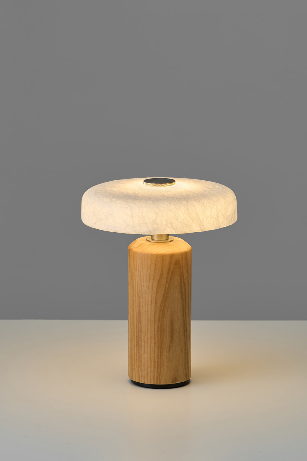 Tavellen natural ash and silk rechargeable table lamp, full product photograph with warm light