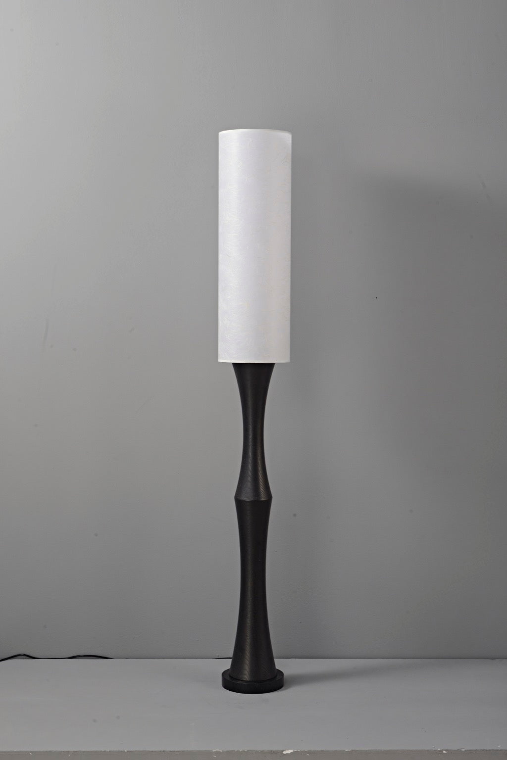 Tavrane black ash wood and fabric floor lamp, overall, light off