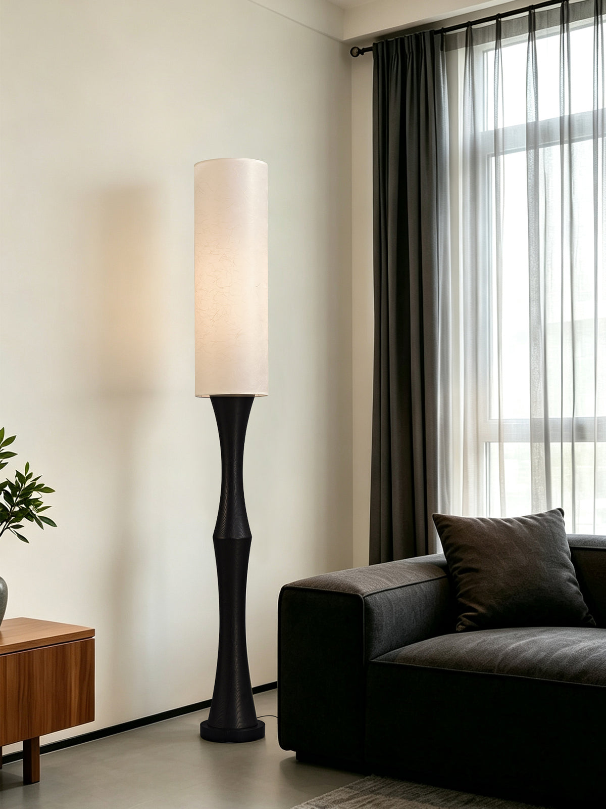 Tavrane black ash wood and fabric floor lamp, source scene
