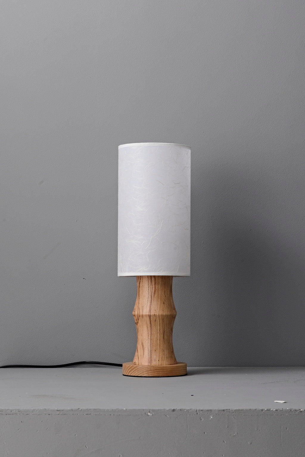 Tavrane natural ash wood and fabric table lamp, overall, light off