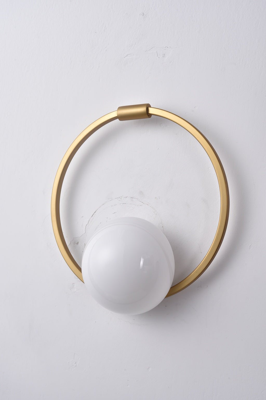 Actual installed Gold circular ring glass wall sconce, light off