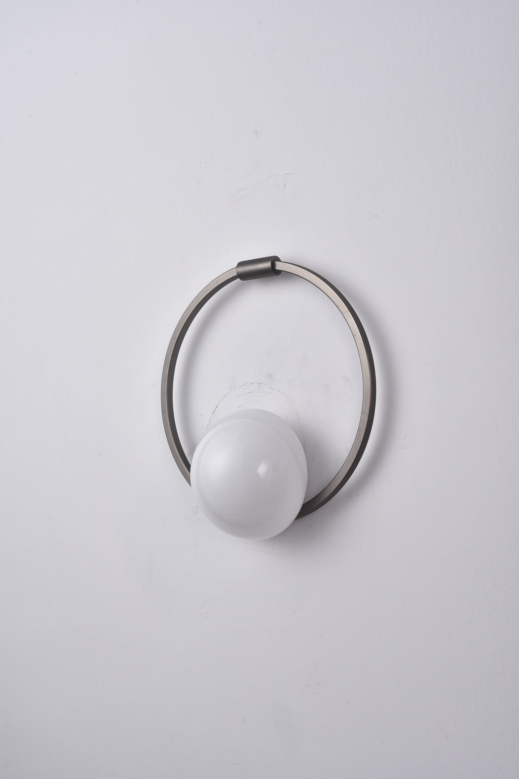 Actual installed Silver circular ring glass wall sconce, light off