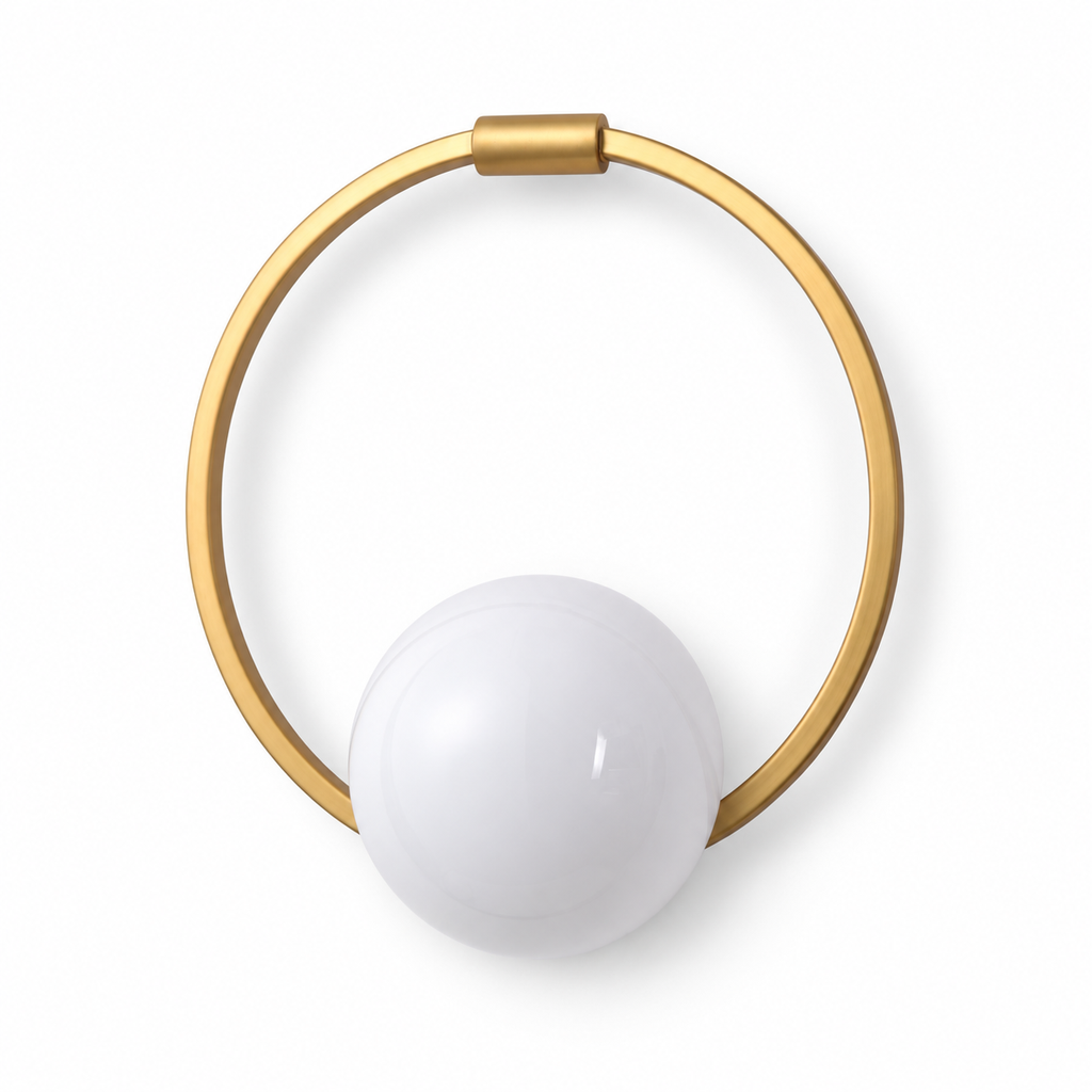 Gold circular ring wall sconce on a white background, light off