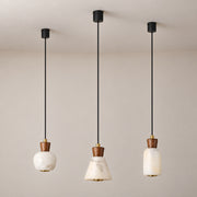 Ashalune alabaster and ash wood mini pendants in rounded, tapered and tall styles, lights off, long black suspension cords