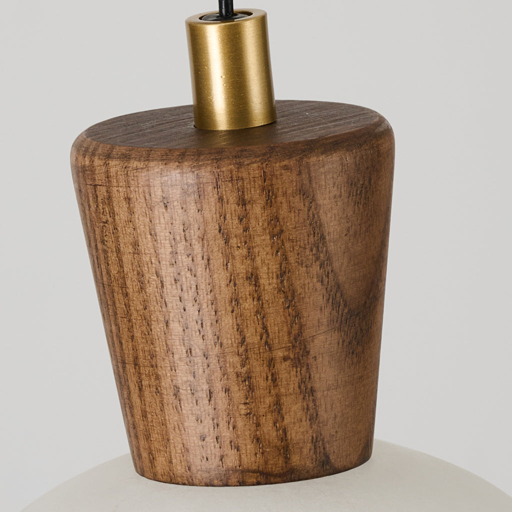 Actual walnut-tone ash wood cap grain detail on Ashalune pendant