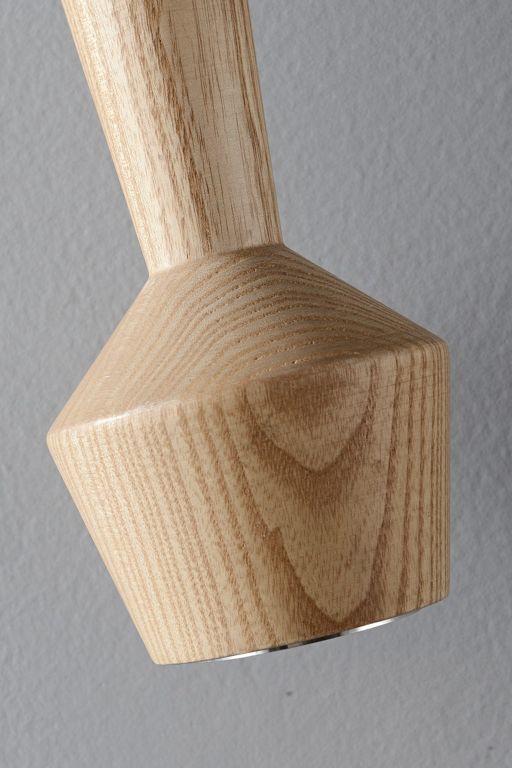 Close-up of the actual natural ash grain and sculptural wooden lamp head