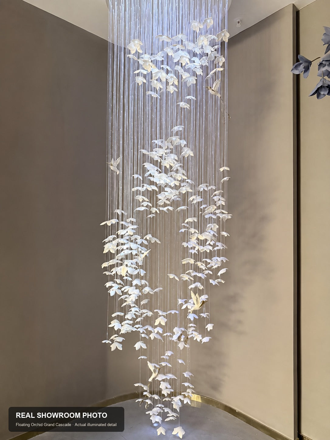 Floating Orchid Ceramic Grand Cascade Chandelier — real showroom photo, full installed cascade view