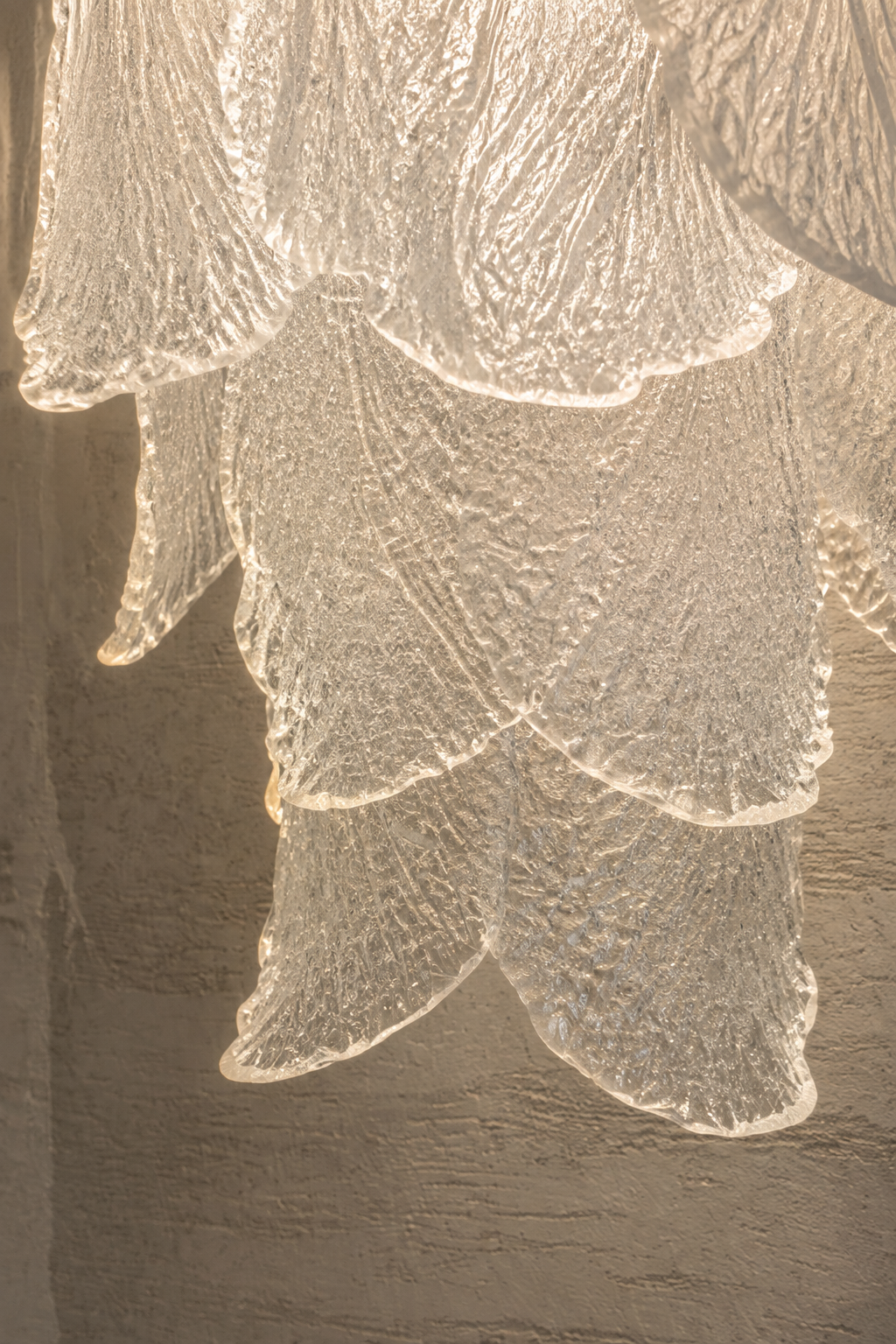 Ceramic and Glass Petal Grand Chandelier: close view of the textured glass petals