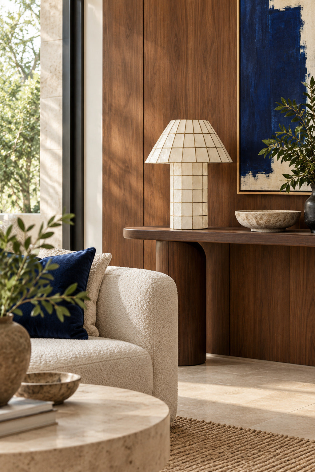 Ivorelle faceted lattice table lamp unlit in a warm contemporary living room