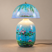 Blue Lotavelle ceramic table lamp with water-lily decoration and a small gold finial