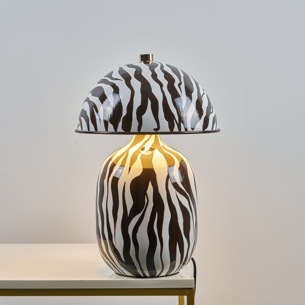 Lotavelle Zebra Ceramic Table Lamp — genuine product photograph with light on