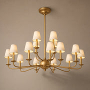 Tiered Brass and Fabric Linear Chandelier product view on a warm neutral background, view 1