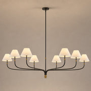 Brass and Black Linear Chandelier product view on a warm neutral background, view 1