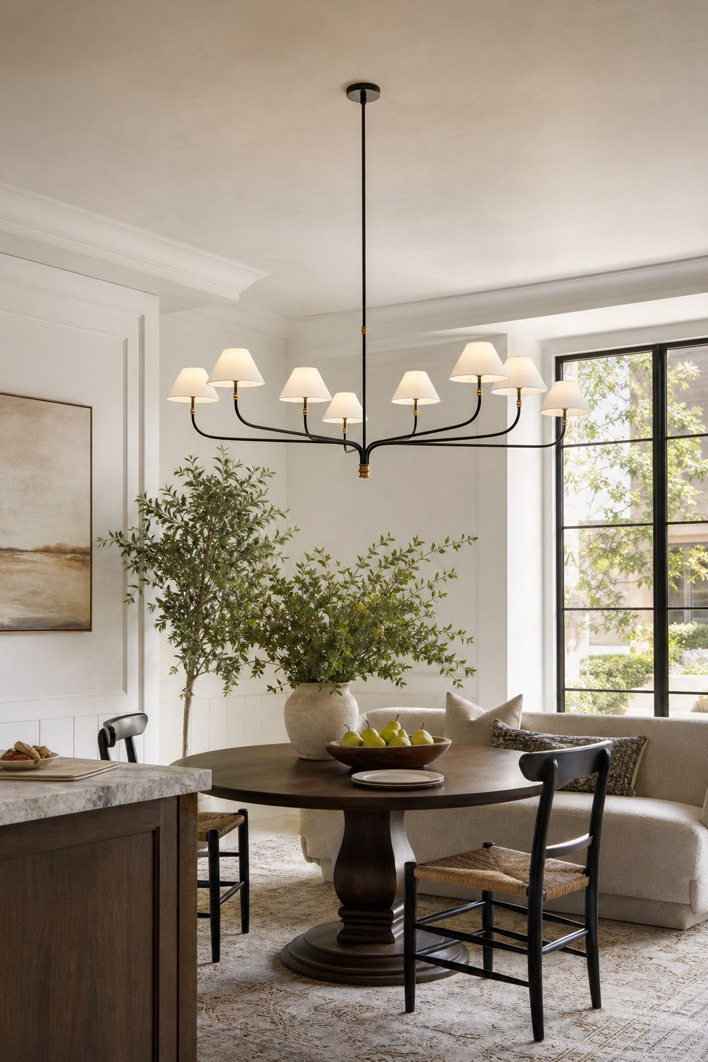 Brass and Black Linear Chandelier installed over a kitchen island, view 3