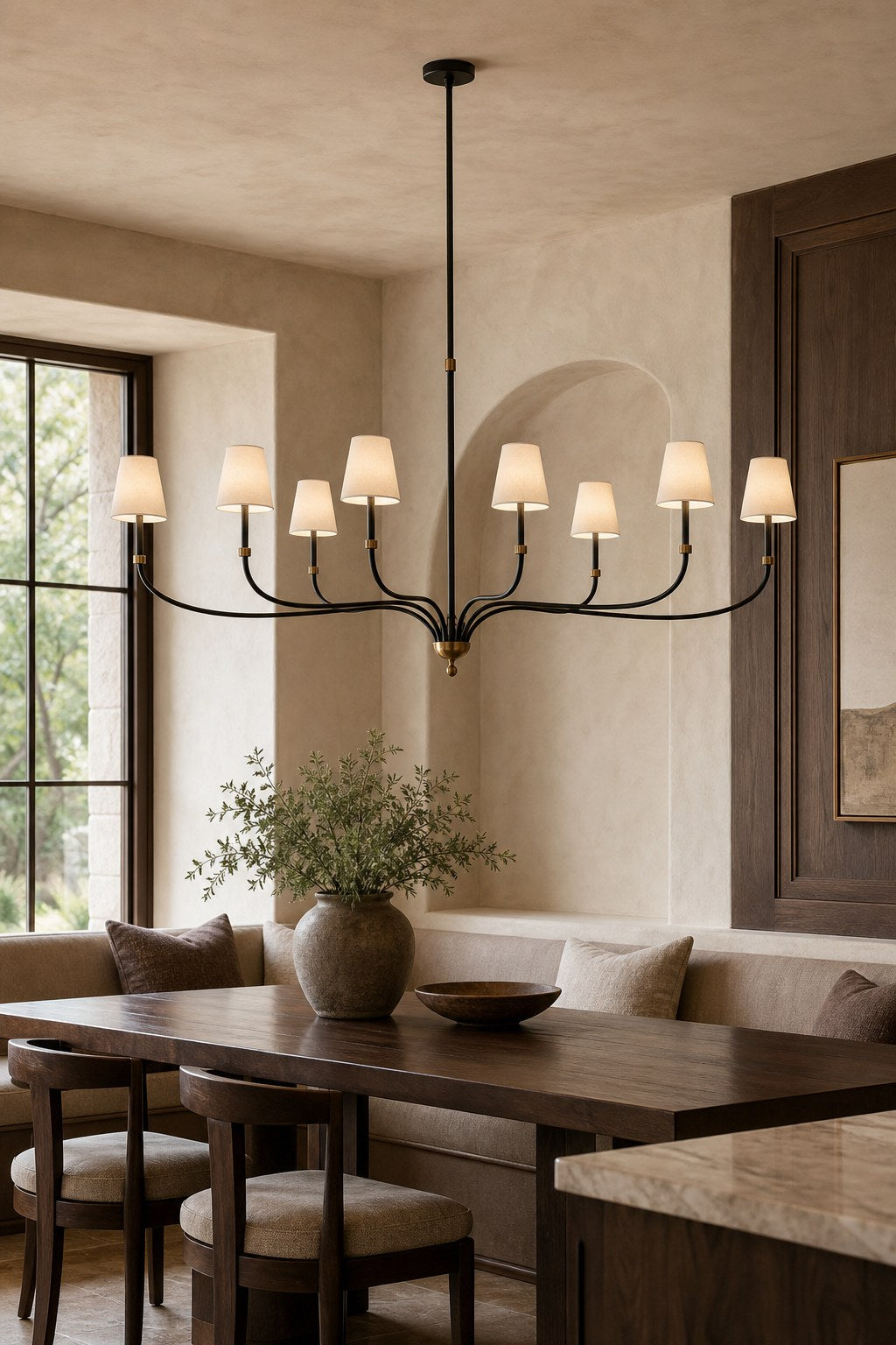 Brass and Black Linear Chandelier installed over a dining area, view 8