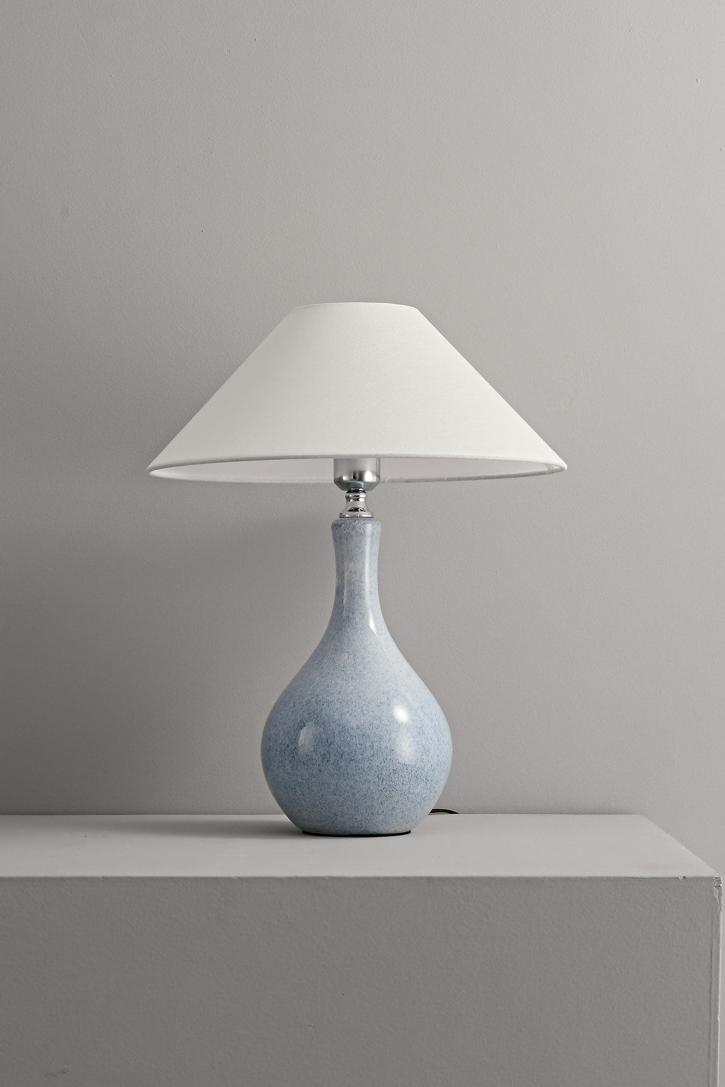 Mist-Blue glazed ceramic table lamp shown switched off