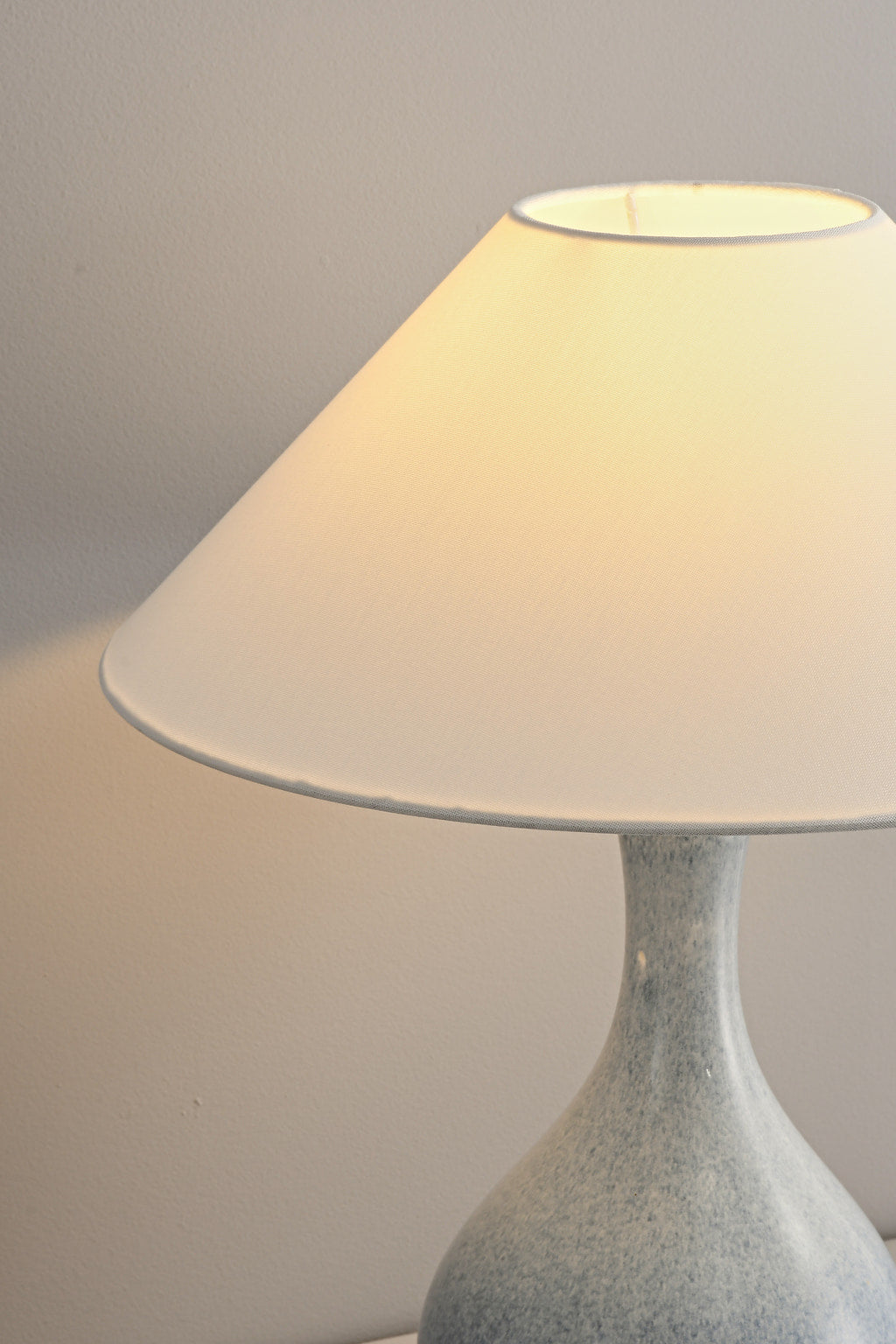 Close view of the Mist-Blue table lamp fabric shade