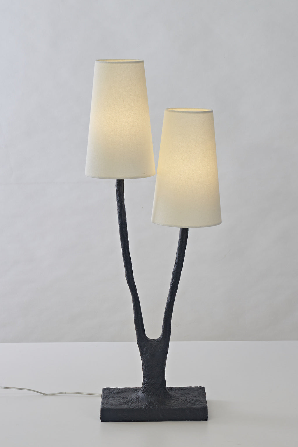 Noirbough branch table lamp complete real product photograph with both linen shades illuminated