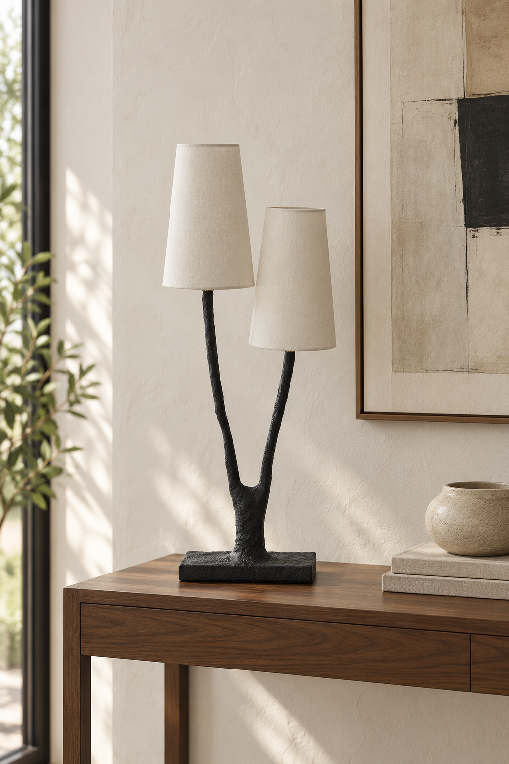 Noirbough branch table lamp unlit on a modern console