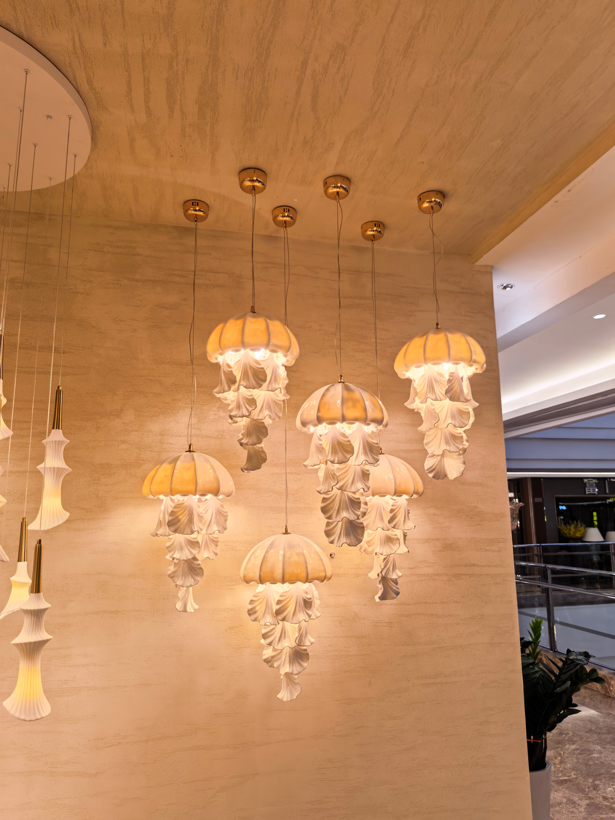 Ondelisse Ivory Jellyfish Pendant Light — original showroom photograph of independently suspended fixtures, angle two