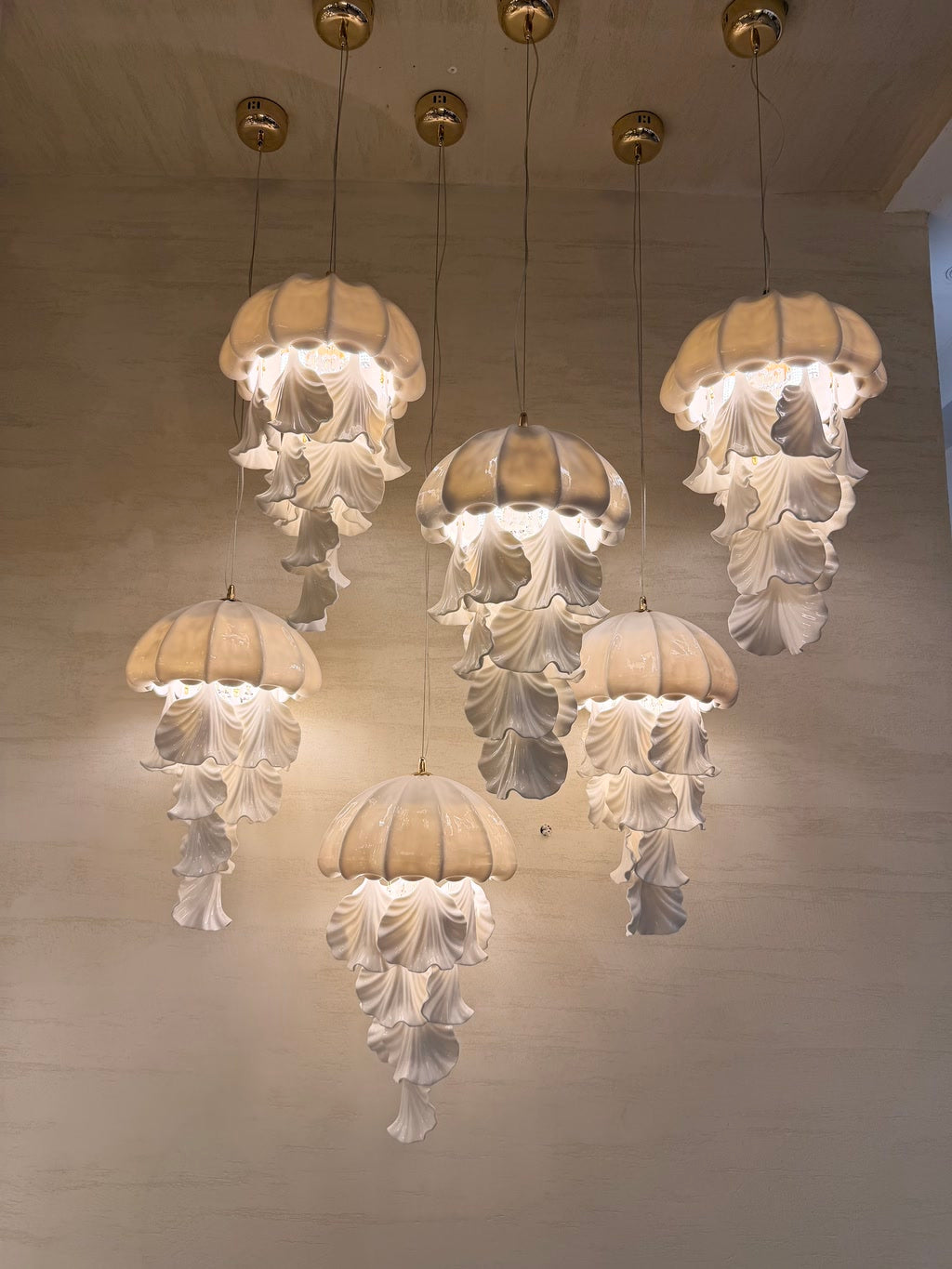 Ondelisse Ivory Jellyfish Pendant Light — original showroom photograph with six independently suspended ivory pendants