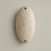 Orellith Beige Stone Wall Sconce in a near-front view on a warm neutral wall