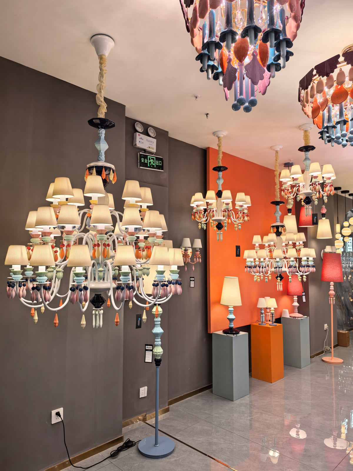 Pastel collection in the showroom — real showroom photograph, wide view
