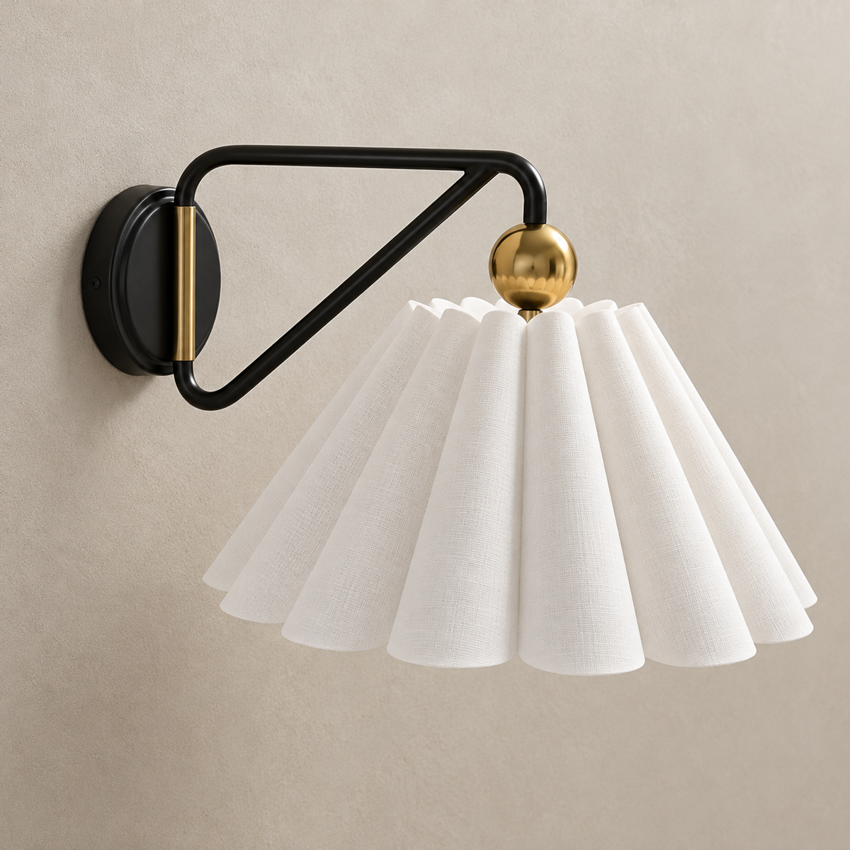 Unlit pleated fabric wall sconce with black loop arm and brass-tone sphere
