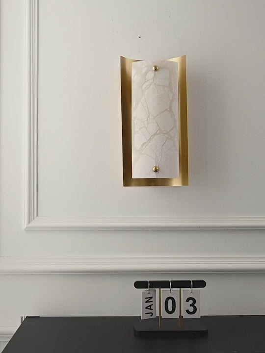Load video: Modern Alabaster Rectangular Wall Sconce in Natural Brass - product gallery video
