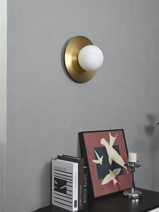 Modern Alabaster Globe Wall Sconce in Natural Brass - product gallery video