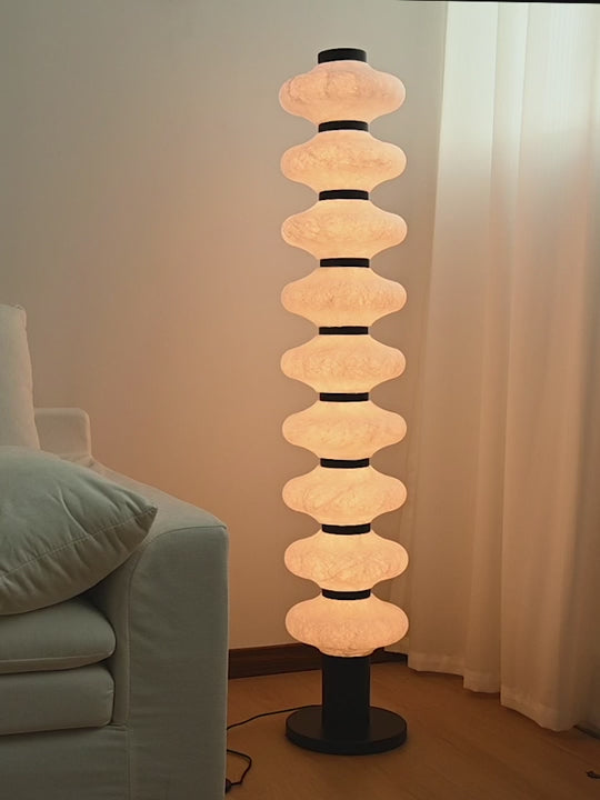 Load video: Modern Mulberry Silk Stacked Floor Lamp in Matte Black and White - product gallery video