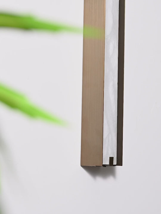 Load video: Modern Alabaster Linear Wall Sconce in Antique Brass - product gallery video