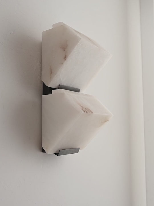 Load video: Modern Alabaster Geometric Wall Sconce - product gallery video